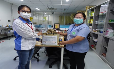 Donation of cloth and paper bags made from unwanted clothing to local hospitals